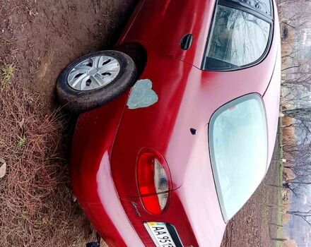 Красный Дэу Ланос, объемом двигателя 1.5 л и пробегом 150 тыс. км за 690 $, фото 4 на Automoto.ua