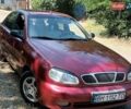 Красный Дэу Ланос, объемом двигателя 1.6 л и пробегом 304 тыс. км за 2900 $, фото 3 на Automoto.ua
