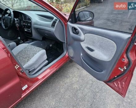 Красный Дэу Ланос, объемом двигателя 1.6 л и пробегом 163 тыс. км за 2650 $, фото 16 на Automoto.ua