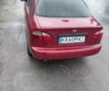 Красный Дэу Ланос, объемом двигателя 1.5 л и пробегом 309 тыс. км за 2000 $, фото 4 на Automoto.ua