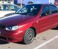 Красный Дэу Ланос, объемом двигателя 1.6 л и пробегом 314 тыс. км за 2300 $, фото 1 на Automoto.ua