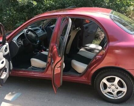 Красный Дэу Ланос, объемом двигателя 1.6 л и пробегом 304 тыс. км за 2900 $, фото 5 на Automoto.ua