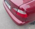 Красный Дэу Ланос, объемом двигателя 1.5 л и пробегом 309 тыс. км за 2200 $, фото 13 на Automoto.ua