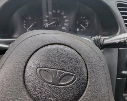 Красный Дэу Ланос, объемом двигателя 1.5 л и пробегом 309 тыс. км за 2000 $, фото 9 на Automoto.ua