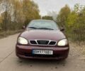 Красный Дэу Ланос, объемом двигателя 1.5 л и пробегом 210 тыс. км за 1700 $, фото 1 на Automoto.ua