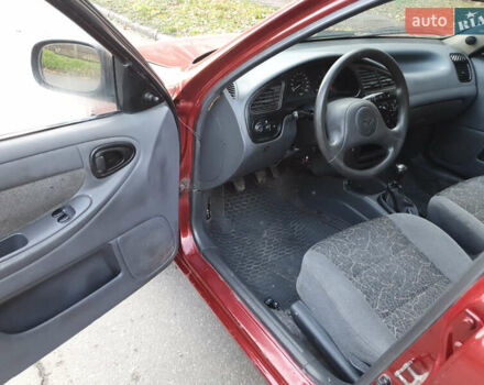 Красный Дэу Ланос, объемом двигателя 1.5 л и пробегом 270 тыс. км за 2450 $, фото 7 на Automoto.ua