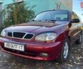 Красный Дэу Ланос, объемом двигателя 1.6 л и пробегом 216 тыс. км за 1900 $, фото 1 на Automoto.ua