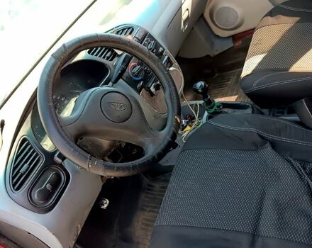 Червоний Деу Ланос, об'ємом двигуна 1.5 л та пробігом 150 тис. км за 1300 $, фото 4 на Automoto.ua