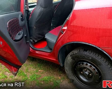 Красный Дэу Ланос, объемом двигателя 1.5 л и пробегом 163 тыс. км за 2200 $, фото 8 на Automoto.ua