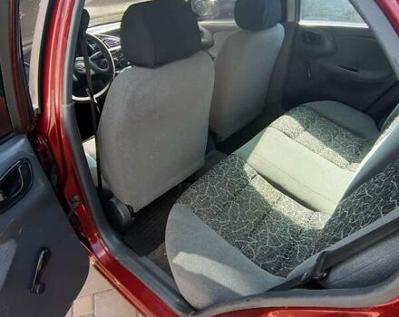 Красный Дэу Ланос, объемом двигателя 1.5 л и пробегом 253 тыс. км за 1700 $, фото 5 на Automoto.ua