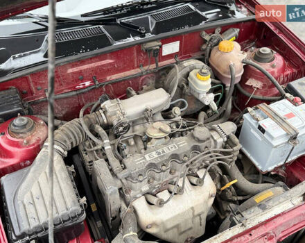 Красный Дэу Ланос, объемом двигателя 1.5 л и пробегом 224 тыс. км за 1750 $, фото 9 на Automoto.ua