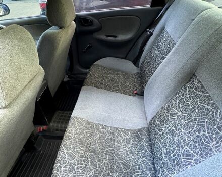 Красный Дэу Ланос, объемом двигателя 1.5 л и пробегом 290 тыс. км за 1950 $, фото 5 на Automoto.ua