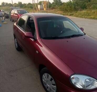 Красный Дэу Ланос, объемом двигателя 1.6 л и пробегом 280 тыс. км за 2600 $, фото 1 на Automoto.ua