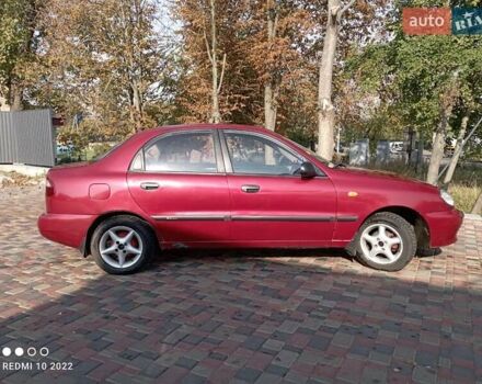 Красный Дэу Ланос, объемом двигателя 1.5 л и пробегом 215 тыс. км за 3000 $, фото 2 на Automoto.ua
