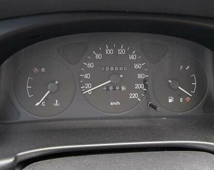 Красный Дэу Ланос, объемом двигателя 1.5 л и пробегом 128 тыс. км за 3550 $, фото 5 на Automoto.ua