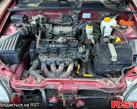 Красный Дэу Ланос, объемом двигателя 1.5 л и пробегом 290 тыс. км за 1950 $, фото 11 на Automoto.ua