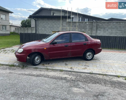 Красный Дэу Ланос, объемом двигателя 1.5 л и пробегом 250 тыс. км за 1150 $, фото 2 на Automoto.ua