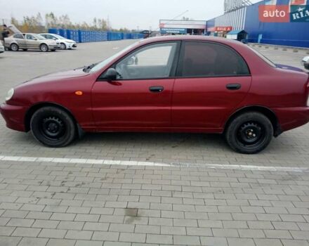 Красный Дэу Ланос, объемом двигателя 1.5 л и пробегом 322 тыс. км за 2300 $, фото 1 на Automoto.ua