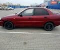 Красный Дэу Ланос, объемом двигателя 1.5 л и пробегом 322 тыс. км за 2300 $, фото 1 на Automoto.ua