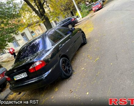 Красный Дэу Ланос, объемом двигателя 1.5 л и пробегом 116 тыс. км за 3500 $, фото 8 на Automoto.ua