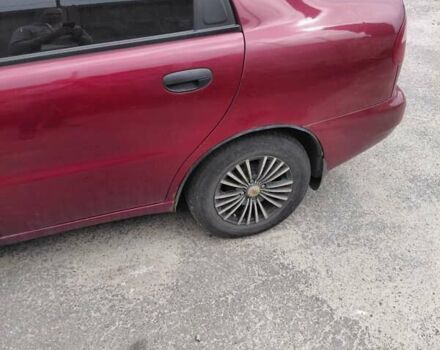 Красный Дэу Ланос, объемом двигателя 1.5 л и пробегом 309 тыс. км за 2000 $, фото 11 на Automoto.ua