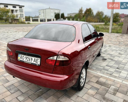 Красный Дэу Ланос, объемом двигателя 1.5 л и пробегом 250 тыс. км за 1950 $, фото 27 на Automoto.ua