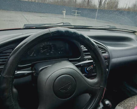 Красный Дэу Ланос, объемом двигателя 1.5 л и пробегом 153 тыс. км за 2000 $, фото 7 на Automoto.ua