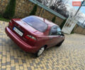 Червоний Деу Ланос, об'ємом двигуна 1.5 л та пробігом 244 тис. км за 2750 $, фото 1 на Automoto.ua