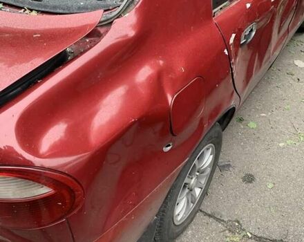 Красный Дэу Ланос, объемом двигателя 1.5 л и пробегом 120 тыс. км за 1600 $, фото 1 на Automoto.ua