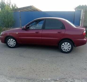 Красный Дэу Ланос, объемом двигателя 1.6 л и пробегом 280 тыс. км за 2600 $, фото 7 на Automoto.ua