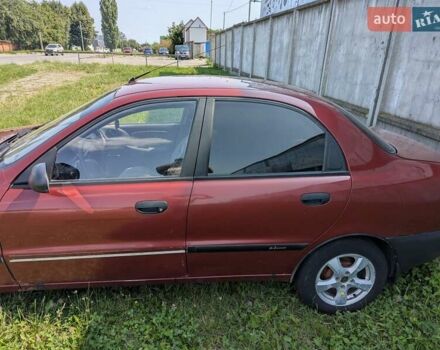 Красный Дэу Ланос, объемом двигателя 1.5 л и пробегом 205 тыс. км за 3000 $, фото 2 на Automoto.ua