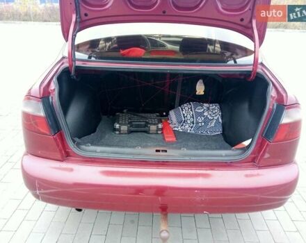 Красный Дэу Ланос, объемом двигателя 1.5 л и пробегом 322 тыс. км за 2300 $, фото 13 на Automoto.ua
