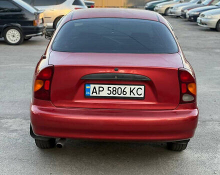 Красный Дэу Ланос, объемом двигателя 1.5 л и пробегом 225 тыс. км за 2350 $, фото 2 на Automoto.ua