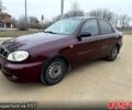 Красный Дэу Ланос, объемом двигателя 1.5 л и пробегом 220 тыс. км за 2350 $, фото 2 на Automoto.ua