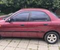 Красный Дэу Ланос, объемом двигателя 1.5 л и пробегом 128 тыс. км за 3550 $, фото 2 на Automoto.ua