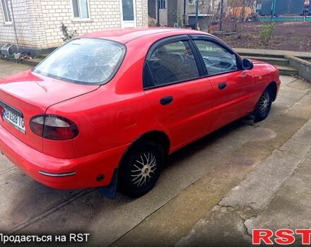 Красный Дэу Ланос, объемом двигателя 1.5 л и пробегом 350 тыс. км за 2000 $, фото 2 на Automoto.ua