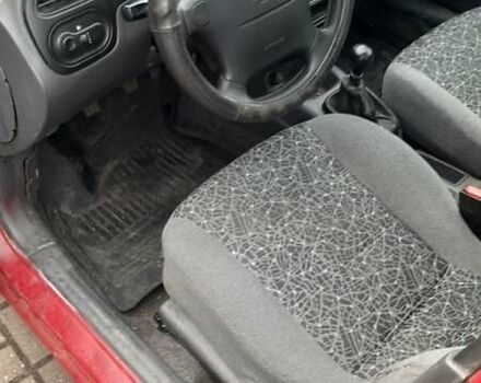 Червоний Деу Ланос, об'ємом двигуна 1.5 л та пробігом 151 тис. км за 1399 $, фото 13 на Automoto.ua