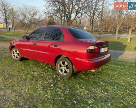 Красный Дэу Ланос, объемом двигателя 1.5 л и пробегом 300 тыс. км за 2999 $, фото 2 на Automoto.ua