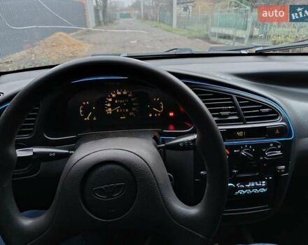 Красный Дэу Ланос, объемом двигателя 1.3 л и пробегом 270 тыс. км за 1500 $, фото 3 на Automoto.ua