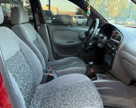Красный Дэу Ланос, объемом двигателя 1.5 л и пробегом 225 тыс. км за 2350 $, фото 9 на Automoto.ua