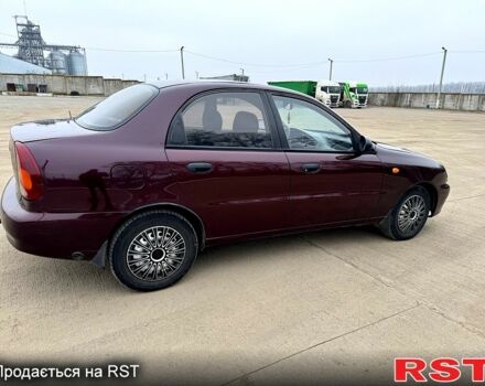 Красный Дэу Ланос, объемом двигателя 1.5 л и пробегом 220 тыс. км за 2350 $, фото 6 на Automoto.ua