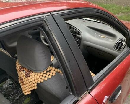 Красный Дэу Ланос, объемом двигателя 1.5 л и пробегом 120 тыс. км за 1600 $, фото 6 на Automoto.ua