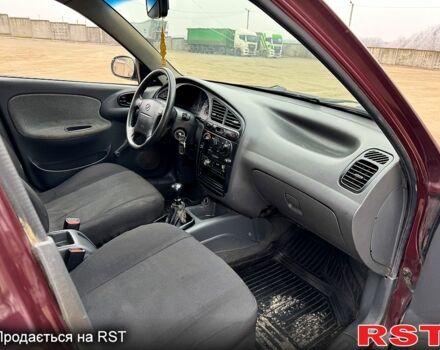 Красный Дэу Ланос, объемом двигателя 1.5 л и пробегом 220 тыс. км за 2350 $, фото 9 на Automoto.ua
