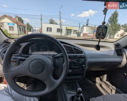 Красный Дэу Ланос, объемом двигателя 1.5 л и пробегом 205 тыс. км за 3000 $, фото 20 на Automoto.ua