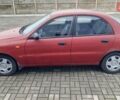 Красный Дэу Ланос, объемом двигателя 1.5 л и пробегом 151 тыс. км за 1350 $, фото 4 на Automoto.ua