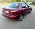Красный Дэу Ланос, объемом двигателя 1.6 л и пробегом 280 тыс. км за 2600 $, фото 5 на Automoto.ua