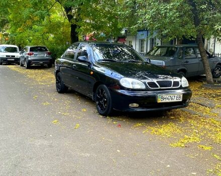 Красный Дэу Ланос, объемом двигателя 1.5 л и пробегом 116 тыс. км за 3500 $, фото 5 на Automoto.ua