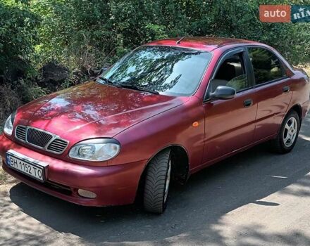 Красный Дэу Ланос, объемом двигателя 1.6 л и пробегом 304 тыс. км за 2900 $, фото 2 на Automoto.ua