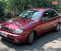 Красный Дэу Ланос, объемом двигателя 1.6 л и пробегом 304 тыс. км за 2900 $, фото 2 на Automoto.ua