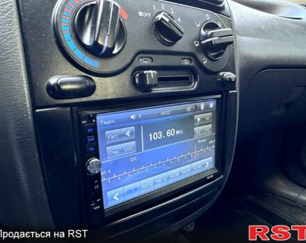 Красный Дэу Ланос, объемом двигателя 1.5 л и пробегом 290 тыс. км за 1950 $, фото 7 на Automoto.ua